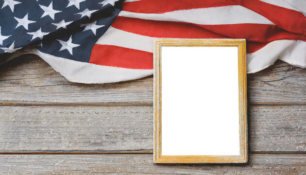 USA Memorial day. Blank White frame mockup. American flag on a rustic wooden background. Veterans day, Labor day, or 4th of July celebration. Copy space, minimalistic illustration.
