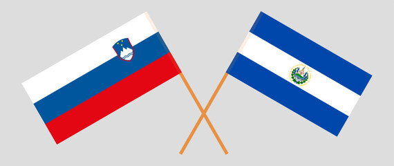 Crossed flags of Slovenia and El Salvador. Official colors. Correct proportion