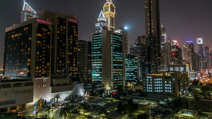 Downtown Dubai towers night timelapse. Aerial view of Sheikh Zayed road with skyscrapers.