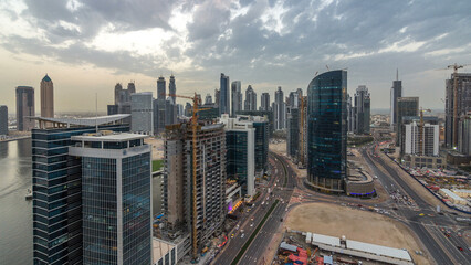 Dubai business bay towers day to night timelapse aerial