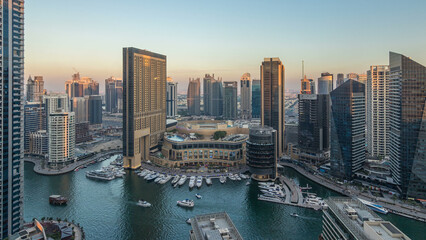 Fototapeta na wymiar Sunset view of Dubai Marina evening aerial timelapse, UAE.