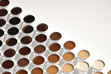 Gradient Display of Coffee Cups Showcasing Assorted Roast Shades on a Table