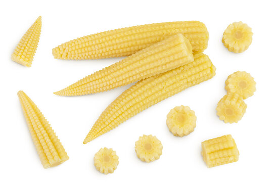Pickled young baby corn cobs isolated on white background. Top view. Flat lay