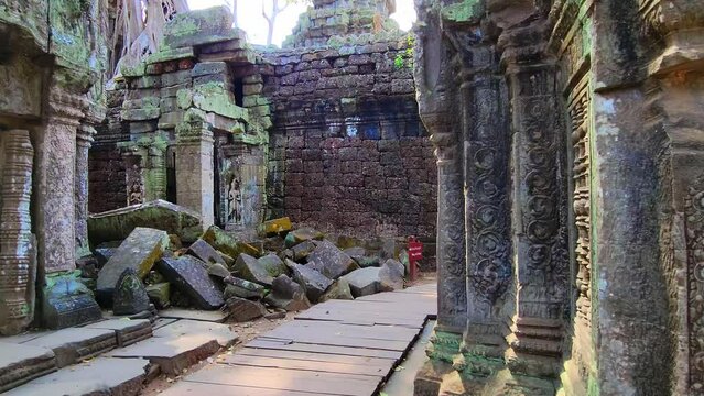 Mysterious Ancient ruins Ta Prohm temple - famous Cambodian landmark, Angkor Wat complex of temples. Siem Reap, Cambodia.