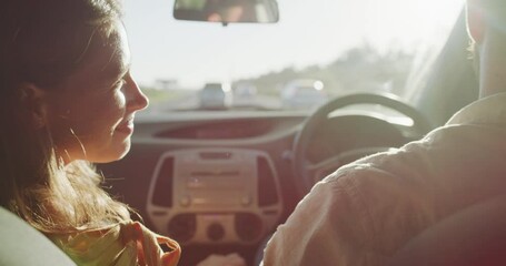 Love, car and relax couple on road trip, street journey or summer travel for romantic adventure on Canada vacation. Moving automobile, affection and back of woman kiss shoulder of husband driving SUV - Powered by Adobe