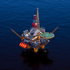 Isolated Offshore Oil Rig Amidst the Vast Blue Ocean: Aerial Perspective