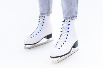 close-up view of white figure skating skates