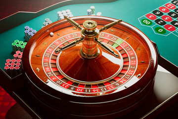 Exquisite Casino Setting: Roulette Wheel, Vibrant Chips on Rich Green Table
