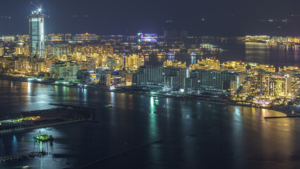 Aerial view of Palm Jumeirah Island night timelapse.