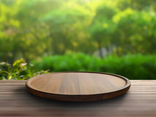 Obraz premium Empty round wooden podium on table in tropical forest background. Green garden outdoor background of circle shape wood platter stand. For cosmetic or food concept product display and presentation.