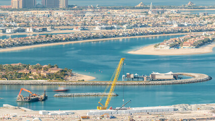 Fototapeta premium Aerial view of Palm Jumeirah Island timelapse.