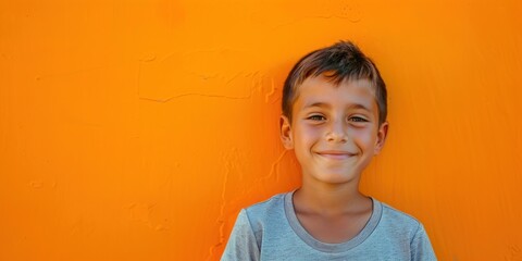 Smiling Central American Boy on Orange