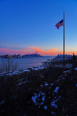 WEEHAWKEN, NJ -18 FEB 2024- Sunset view of the waterfront skyline in Manhattan, New York, seen from across the Hudson River in New Jersey. - 767145179