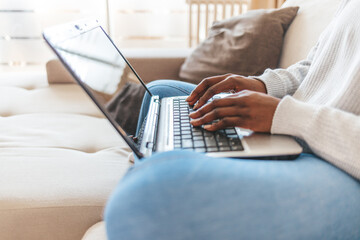 Fototapeta premium Young fashionable woman working at home. Young businesswoman working from home.