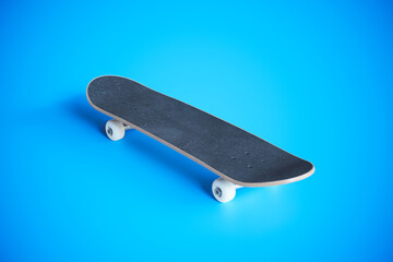 Sleek Black Skateboard with White Wheels on a Vibrant Blue Backdrop