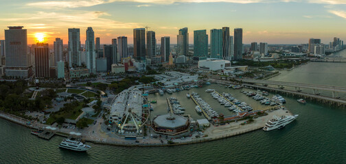 Skyviews Miami Observation Wheel at Bayside Marketplace with reflections in Biscayne Bay water and...