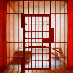 Red-Hued Jail Cell Emphasizes Freedom with Its Ironically Open Gate