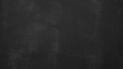 Black scratched anthracite blackboard chalkboard with chalk, concrete wall texture background,...