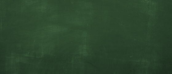 Green scratched chalkboard with chalk, wall texture background, education backdrop
