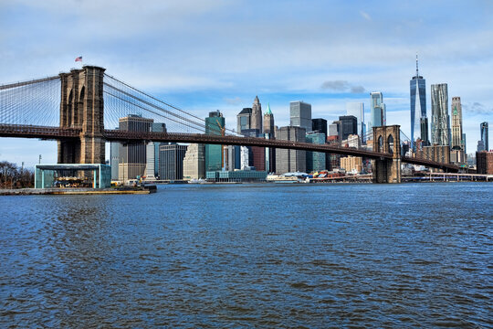 The Brooklyn Bridge and the New York City skyline.