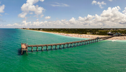 Bright ocean landscape at Venice fishing pier in Florida, USA. Popular vacation place in south