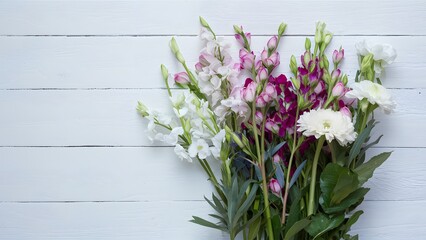 Fresh spring flowers displayed elegantly against clean white backdrop