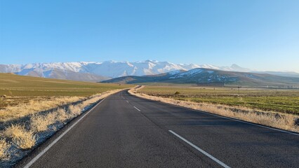 Inspiring journey through the serene steppes with distant snow-capped mountains in Central Turkey in January
