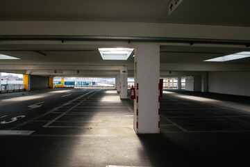 parking spaces, empty multi-storey garage for the public, parking spaces for parking cars in the covered garage. multi floor garage