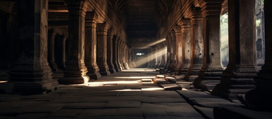 The sunlight filters through the wooden columns of a historic building, casting shadows on the road and illuminating the plants growing in the soil