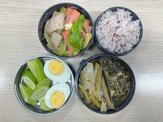 Boiled vegetables, Stir-fried pink noodles with tofu, boiled eggs, and brown rice