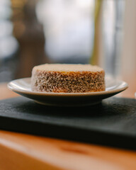 Fresh baked chocolate stuffed cookie from delicate coffee shop  over wood table