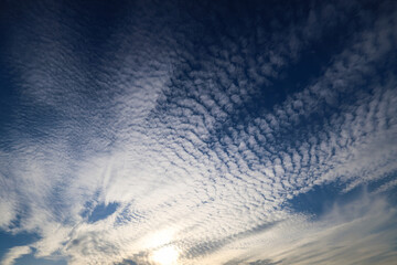 Spectacular waves sky. Undulatus wave clouds indicating a change of weather like rain or storm. Beautiful blue sky and white clouds landscape meteorological photo.