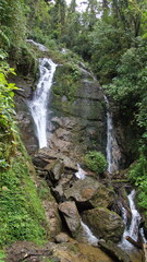 Fototapeta na wymiar Small waterfall at the high altitude Paraiso Quetzal Lodge outside of San Jose, Costa Rica