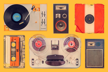 Collection of a vintage turntable, speakers, record, compact cassette and tape recorder on an orange background - 767200762
