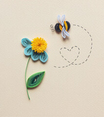 Paper quilled Flower and a paper bee on light background. bee flying in a heart shaped dot line....