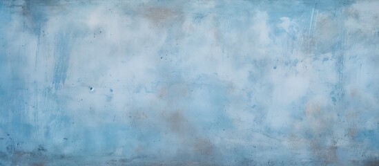 Obraz premium a close up of a blue wall with a cloudy sky in the background . High quality