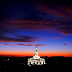 Pocatello LDS Mormon Latter-Day Saint Temple at Sunset with Glowing Lights