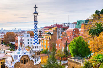 Park Guell in Barcelona, Spain. Beautiful cityscape at sunrise.