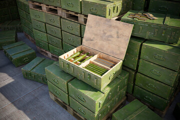 Close-Up View: Ammunition Boxes and Military Supplies in a Secure Depot