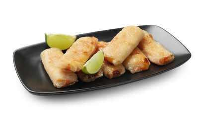 Tasty fried spring rolls and lime isolated on white