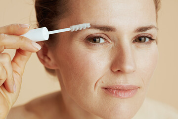 woman with brow brush