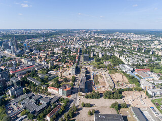 Vilnius City Cityscape, Lithuania. Snipiskes Zirmunai District, Business Town in Background. Drone Point of View. Abandoned Zalgiris Stadium
