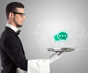 Close-up of waiter serving social media icons - 767231561