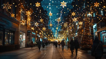Foto auf Leinwand photograph of main road in the city decorated christmas lights People walking and shopping old building scenery black sky decorated with stars It conveys the atmosphere of the festival, happiness and  © venusvi