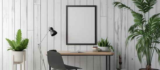 A mock-up of a poster frame is displayed in an office interior alongside a desk, lamp, plants, and chair, against a background of white wooden walls and floors. - Powered by Adobe