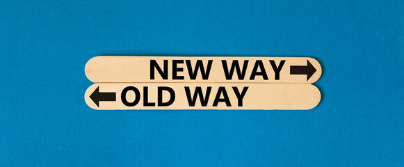 New or old way symbol. Concept word New way Old way on beautiful wooden stick. Beautiful blue table...