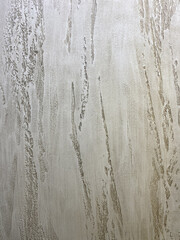 Textured colored plaster, can be used for the background. It has a pronounced structure