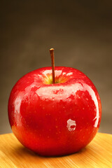 ripe red apple on the bottom