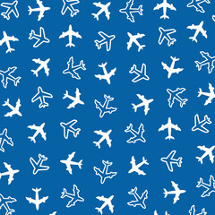 Seamless pattern of airplane silhouette on a blue background.
