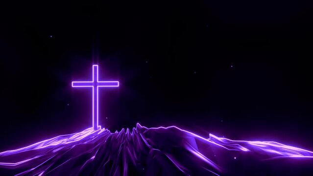 Christian cross crucifix on purple glowing mountain landscape 